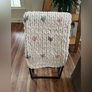 Chunky Knit Baby Blanket. Tan with heart accents in sage green, gray and pink